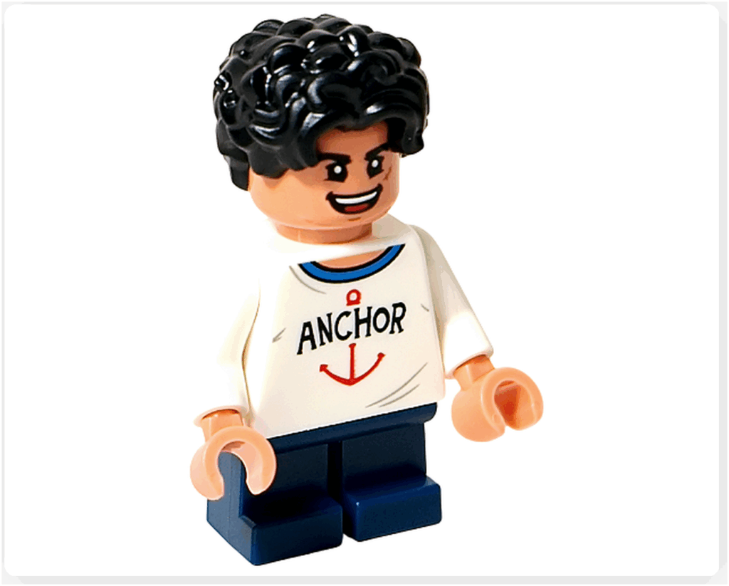 レゴ ONE PIECE 75636「フーシャ村」のルフィ（子供）のミニフィグ正面。錨デザインのシャツと濃紺の足、笑顔の表情が特徴。フーシャ村での無邪気な冒険らしさが伝わる状態。