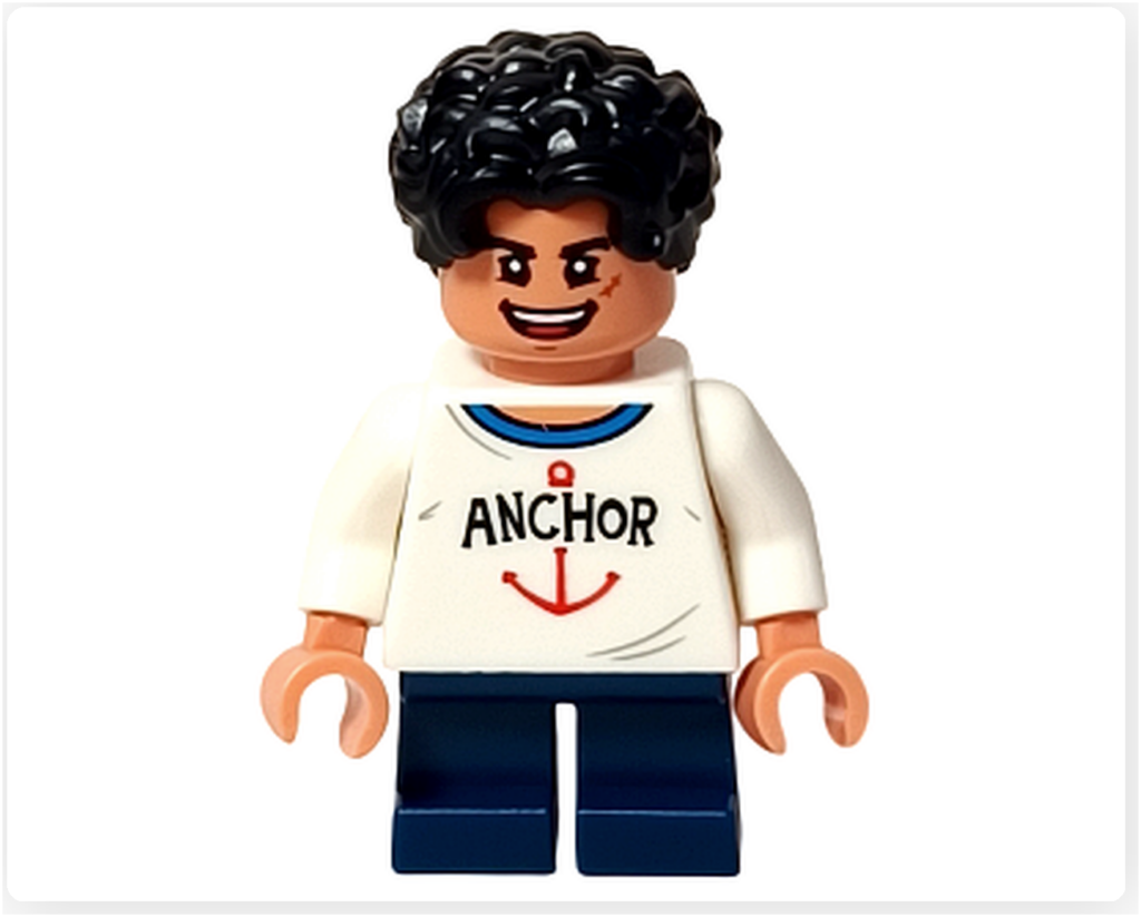 レゴ 75636 ONE PIECE フーシャ村のルフィのミニフィグ正面。白いアンカー柄のシャツ、青い脚パーツ、黒髪の少年ヘアパーツを使用した明るい表情のアングルです。