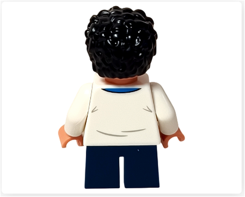 レゴ 75636 ONE PIECE フーシャ村のルフィのミニフィグ背面。黒髪ヘアパーツの後頭部、白シャツの背面プリント、青い脚パーツが見えるアングルです。