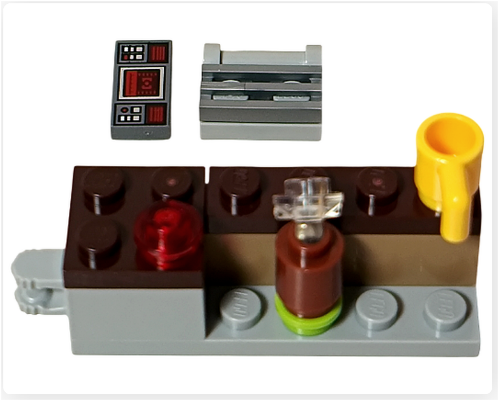 LEGO スター・ウォーズ 75418 アドベントカレンダー2025に含まれる作業台の組立途中。基部に計器パネルや容器パーツが取り付けられた段階が写っている。