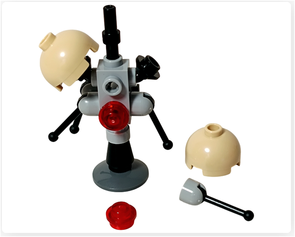 LEGO スター・ウォーズ 75418 アドベントカレンダー2025に含まれるバズ・ドロイドの組立途中。中央ユニットに脚状パーツが取り付けられた工程が写っている。