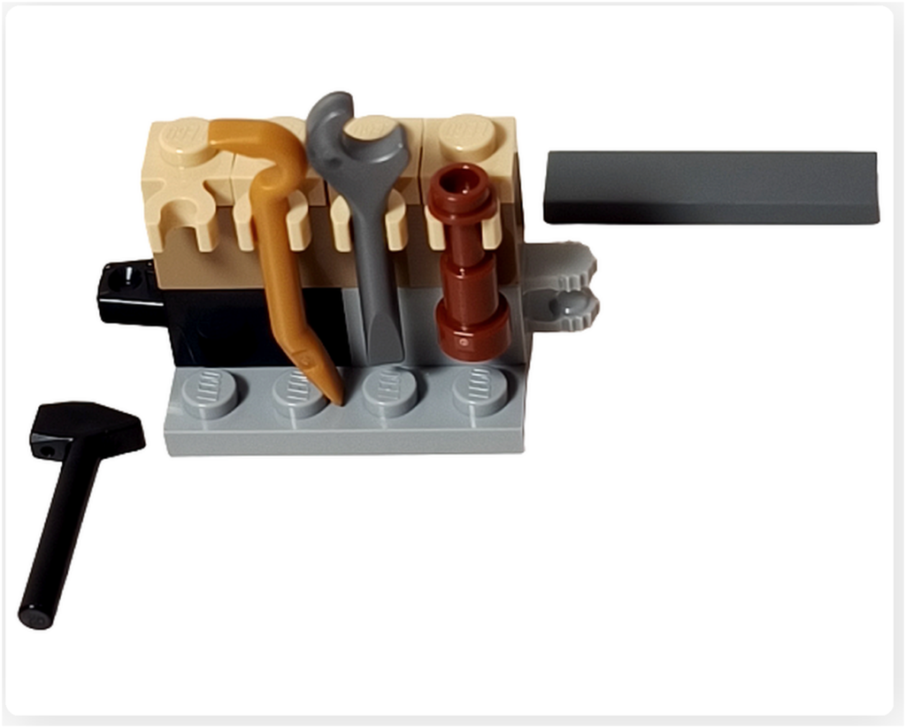 LEGO スター・ウォーズ 75418 アドベントカレンダー2025の工具ラック組立途中の様子。レンチやハンマーなどの工具パーツをラックに配置している工程が写っている。