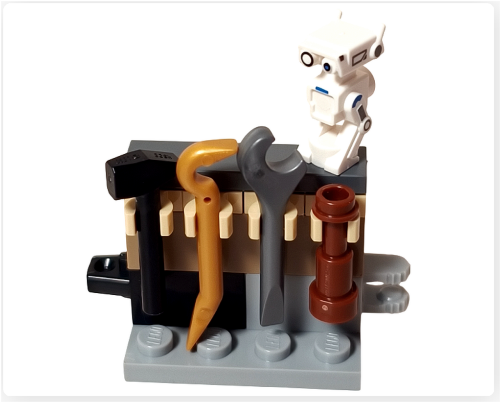 LEGO スター・ウォーズ 75418 アドベントカレンダー2025のプレイシーン。BD-72が工具ラックの上に立ち、並べられた整備用ツールを確認している様子が写っている。
