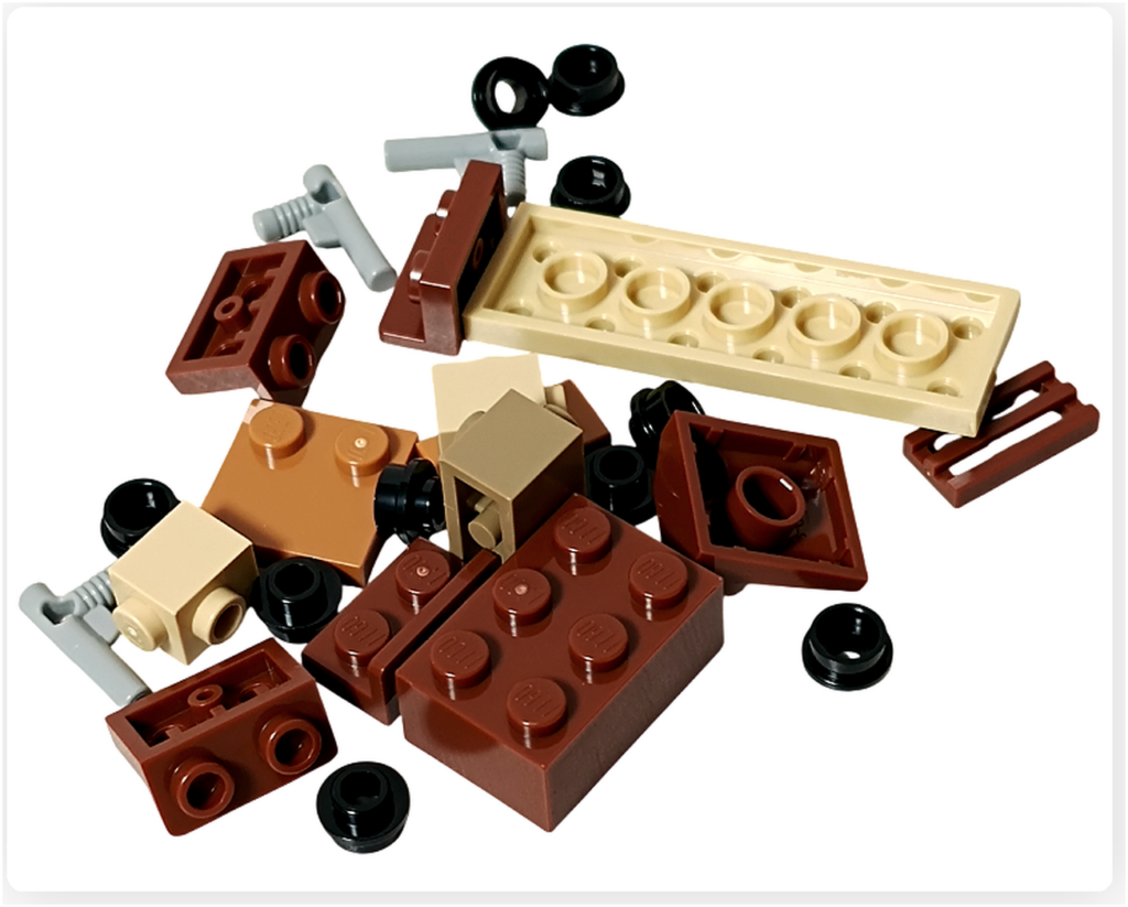 LEGO スター・ウォーズ 75418 アドベントカレンダー2025に含まれるジャワ族小型運搬車の組立前パーツ。茶系パーツと車輪部品が並び、運搬車の構造が確認できる。