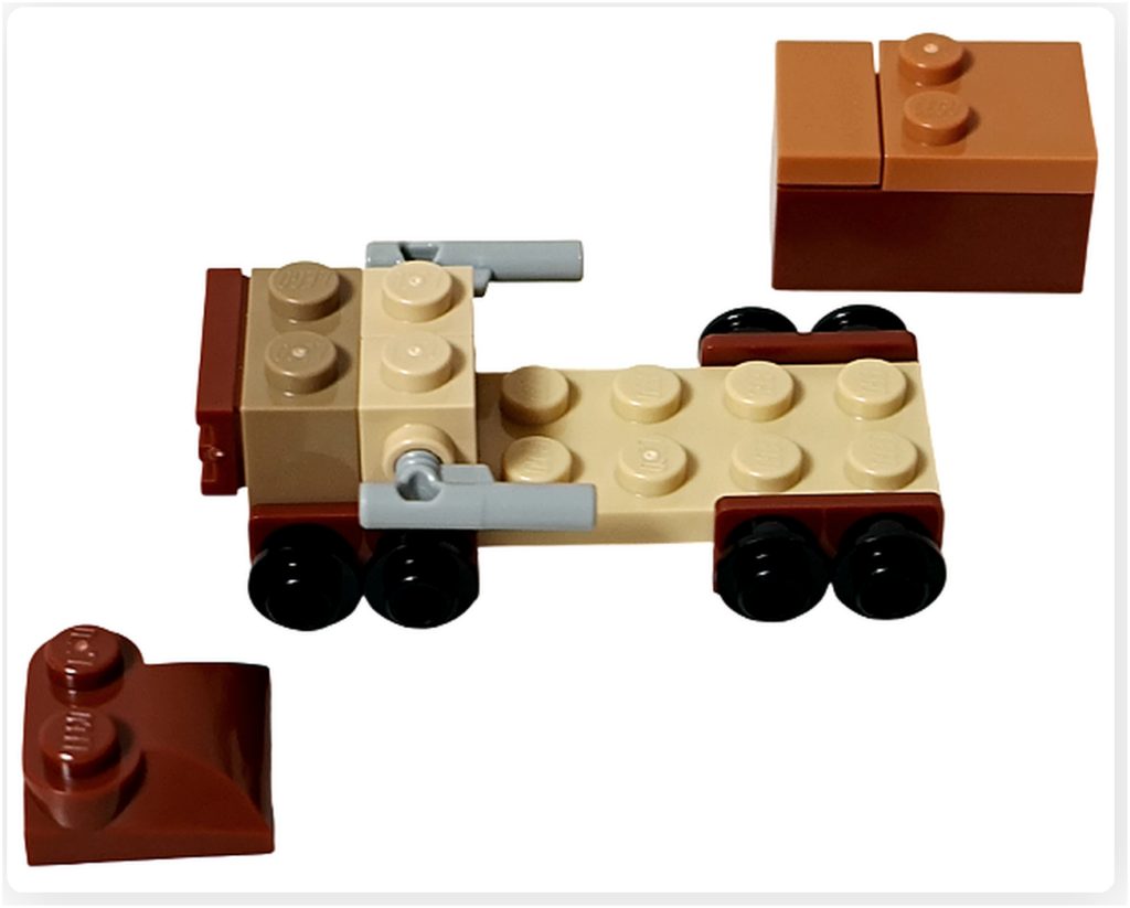LEGO スター・ウォーズ 75418 アドベントカレンダー2025のジャワ族小型運搬車の組立途中工程。車輪と荷台部分を備えた車体フレームが組み上がっている様子が写っている。