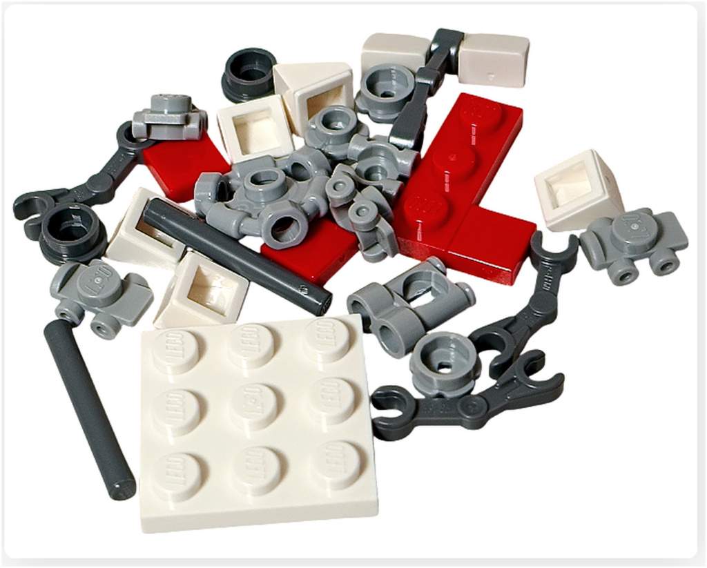 LEGOスター・ウォーズ 75418、16日目のトレッドウェル・ドロイドのパーツ構成。白とグレーを基調に、多関節アームやベース用プレートが並ぶ組立前の状態を写している。