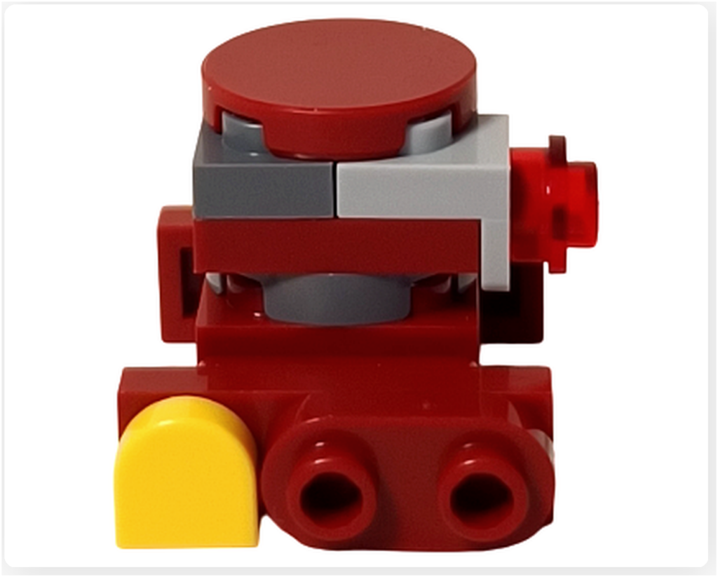 LEGO スター・ウォーズ 75418 アドベントカレンダー2025収録のB2EMOを右側面から撮影。赤いボディ側面に黄色のパーツが配置され、背面側には丸型の接続部とノズル形状のパーツが確認できる。
