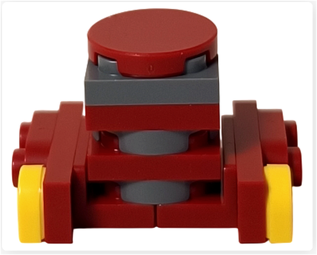 LEGO スター・ウォーズ 75418 アドベントカレンダー2025収録のB2EMOを背面から撮影。赤とダークグレーのブロックが縦方向に重なり、左右に黄色のパーツが配置された、シンプルで機械的な背面構造が確認できる。