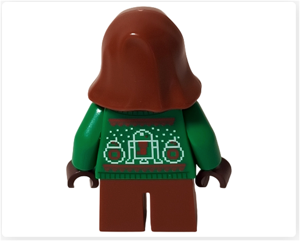 レゴ スター・ウォーズ 75418に含まれるホリデー・ジャワの背面写真。フードに覆われた背中と、祝祭モチーフが描かれたセーターのプリントが、静かな工房の夜と控えめな楽しさを伝えるミニフィグ。