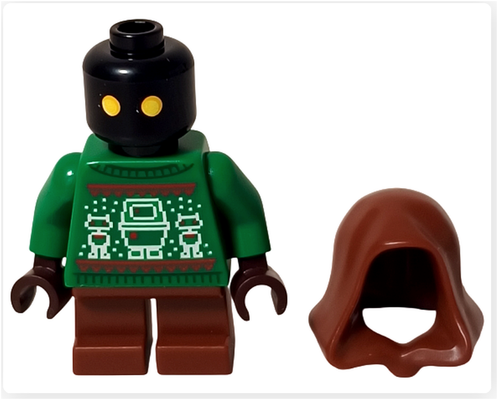 レゴ スター・ウォーズ 75418に登場するホリデー・ジャワのフードなし状態の写真。外したフードが横に置かれ、黒い頭部と黄色い目が露わになった姿から、祝祭衣装に隠れたドロイドの存在感が伝わるミニフィグ。