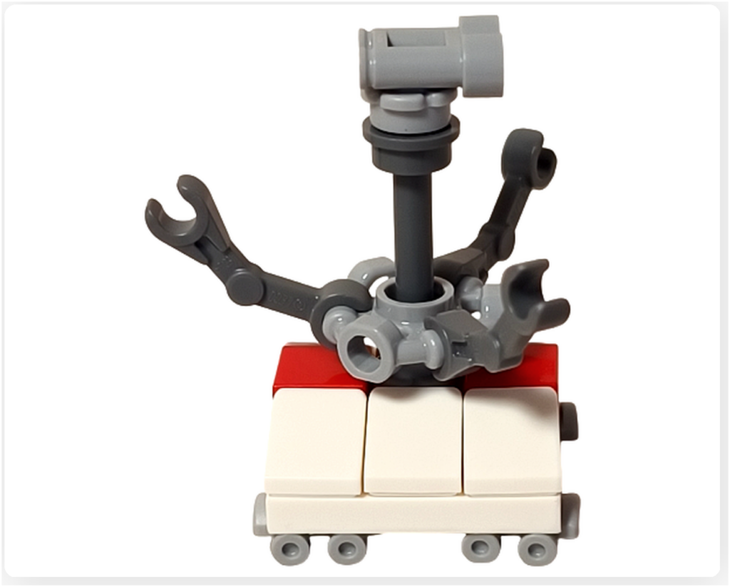 レゴ スター・ウォーズ 75418に登場するトレッドウェル・ドロイドの右側面写真。細長い支柱構造と複数の可動アーム、低い台座が確認でき、工房で働く実用本位のドロイド像を伝えるミニフィグ。