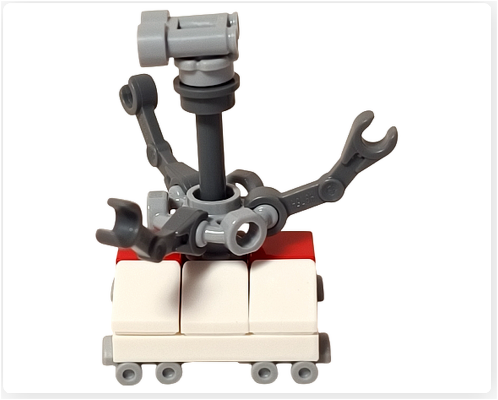 レゴ スター・ウォーズ 75418に登場するトレッドウェル・ドロイドの左側面写真。非対称に配置された可動アームと支柱構造が、工房で用途に応じて動く作業用ドロイドの実用性を伝えるミニフィグ。