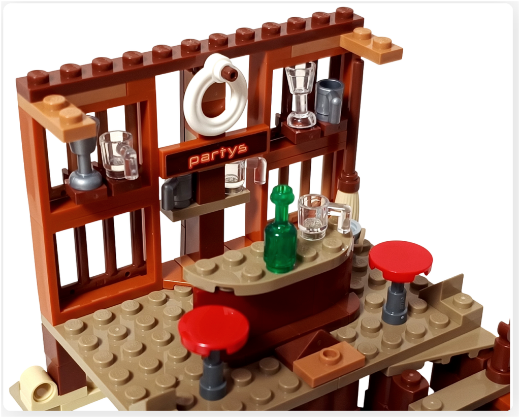 レゴ 75636 フーシャ村 カウンター周辺組立工程。棚へコップや瓶を配置し、カーブした酒場カウンターが完成している状態です。