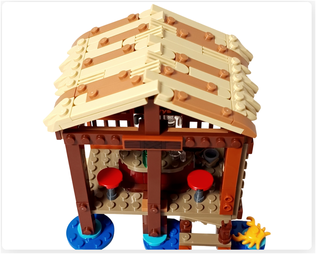 レゴ 75636 フーシャ村 完成した屋根を取り付けた状態。木材風パーツとベージュカラーの屋根が組み合わさり、海辺の酒場らしい外観を確認できる構図です。